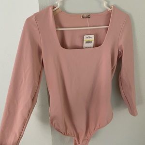 Free People Medium light pink long sleeve bodysuit NWT
